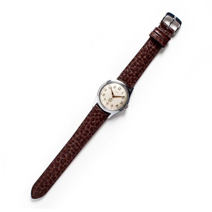 flatlay of The 1958 Timex Marlin Boy Scout
