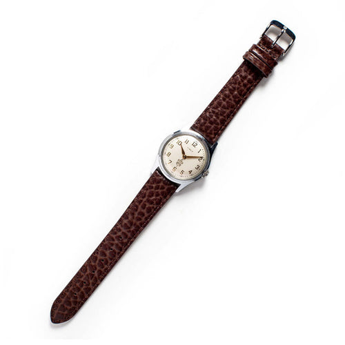 flatlay of The 1958 Timex Marlin Boy Scout