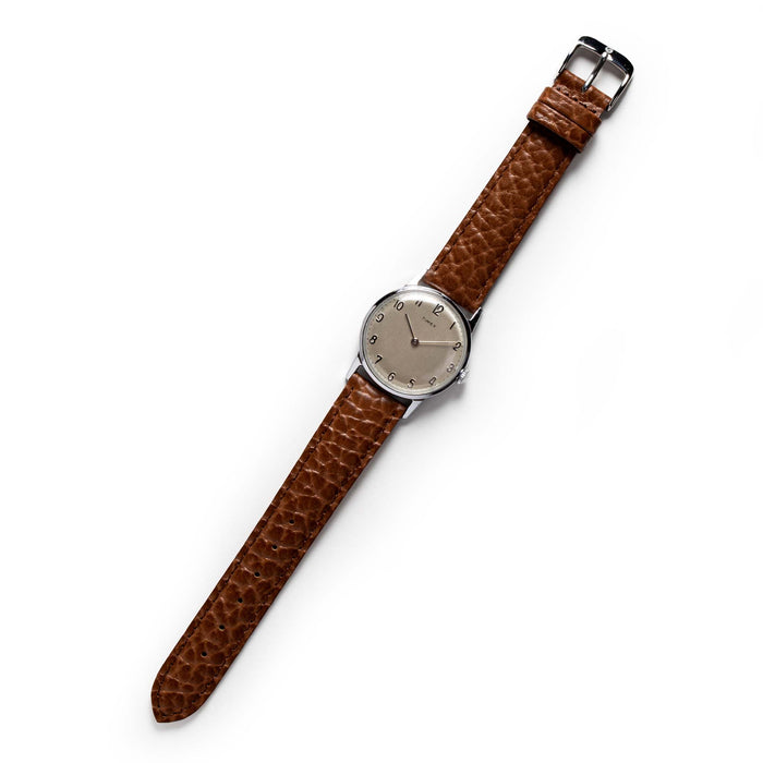 flatlay of The 1966 Timex Mercury