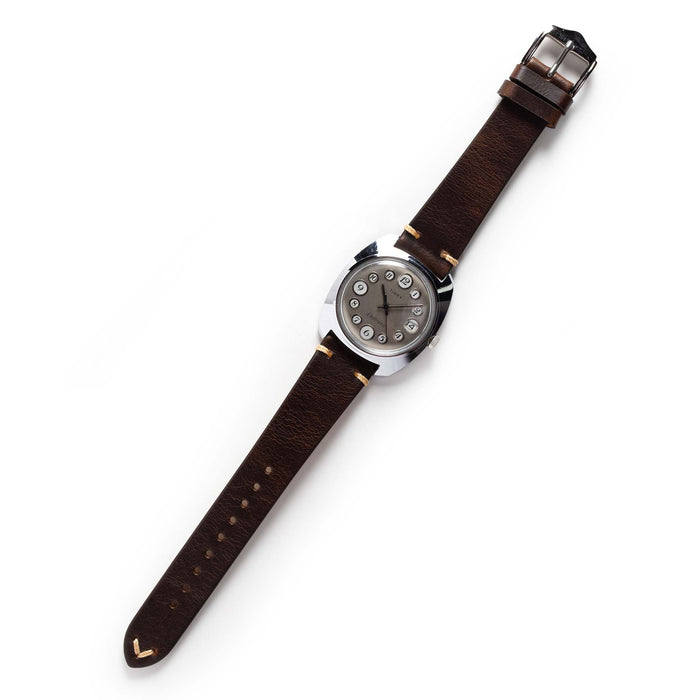 flatlay of The 1974 Timex Electronic "Rotary" Calendar