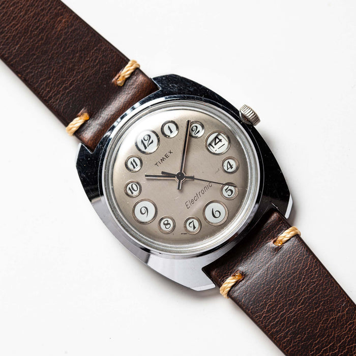material shot of the watchface on The 1974 Timex Electronic "Rotary" Calendar