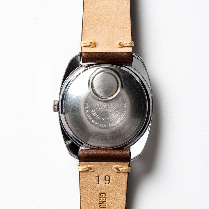 material shot of the back of The 1974 Timex Electronic "Rotary" Calendar