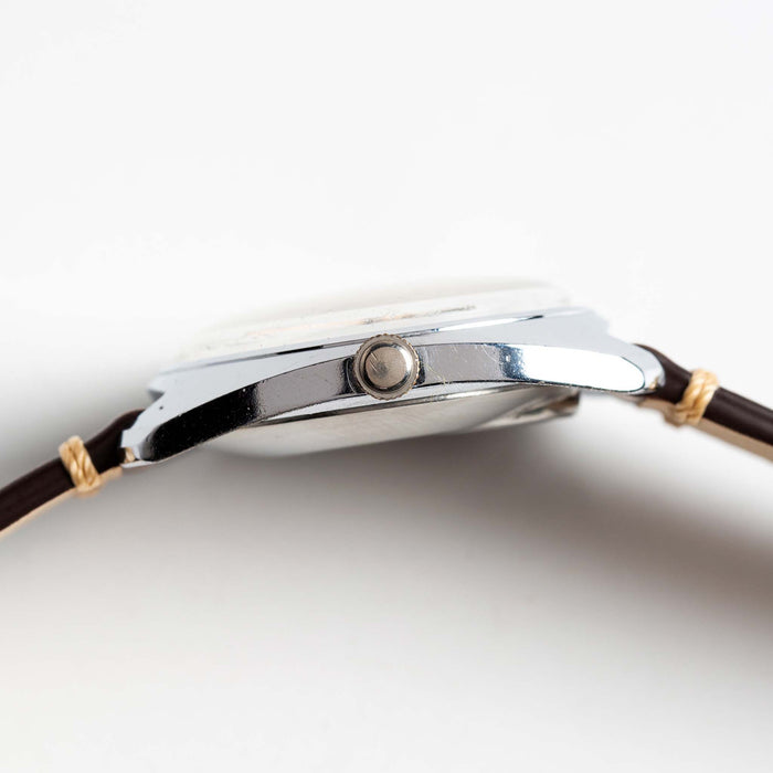 material shot of the side of The 1974 Timex Electronic "Rotary" Calendar