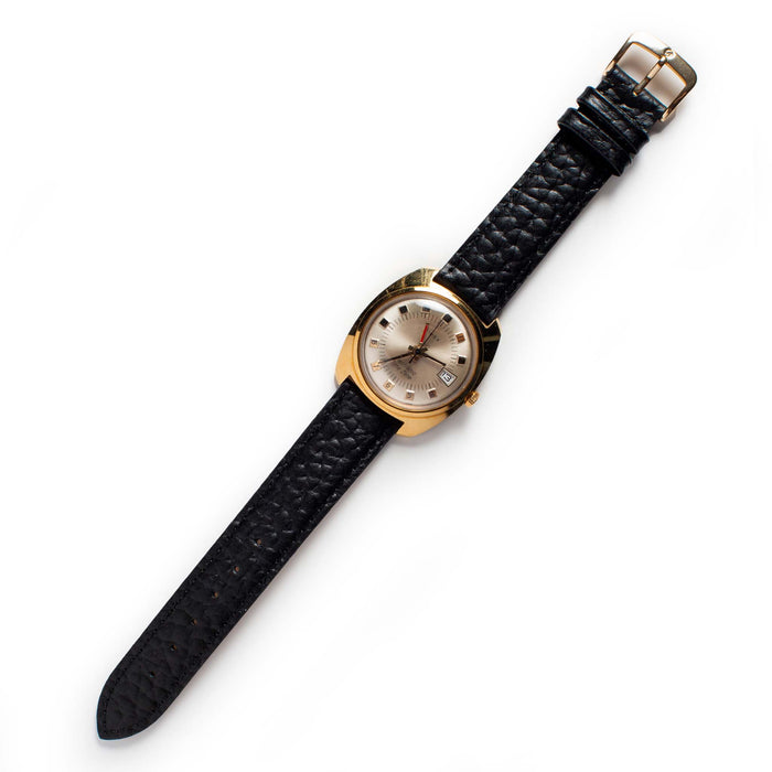 flatlay of The 1974 Timex Electronic Time Zone