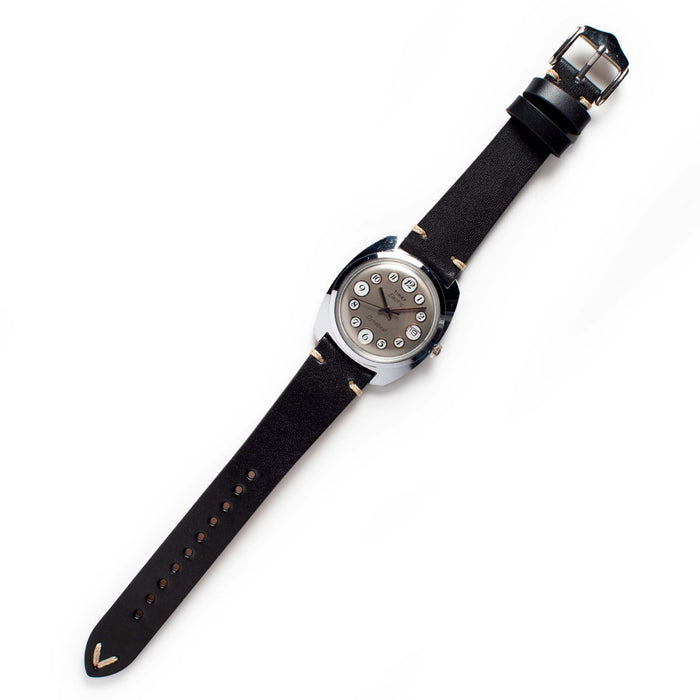 flatlay of the 1975 Timex Electric Dynabeat "Rotary"
