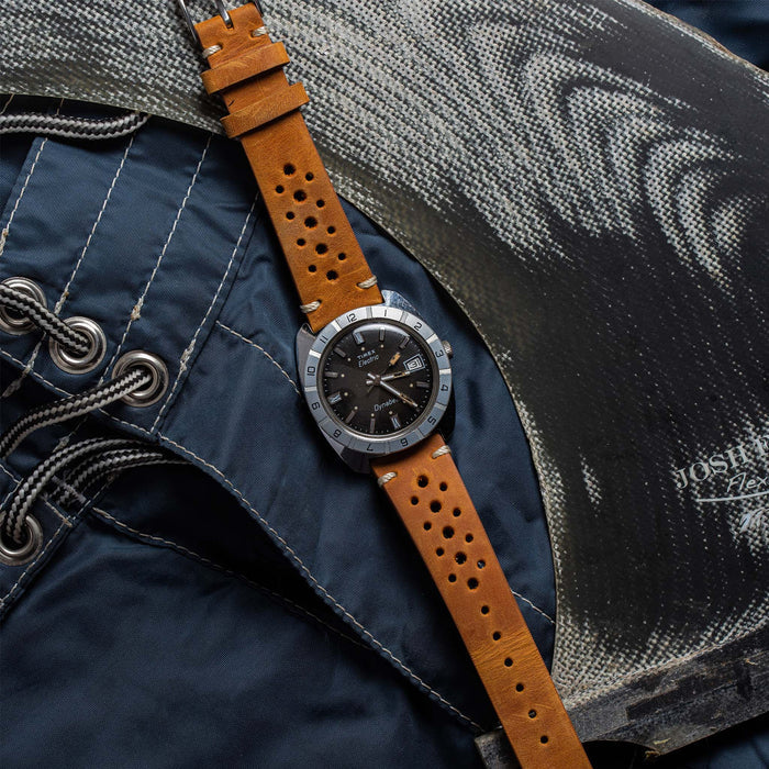 flatlay of the 1976 Timex Electric Dynabeat on a pair of shorts