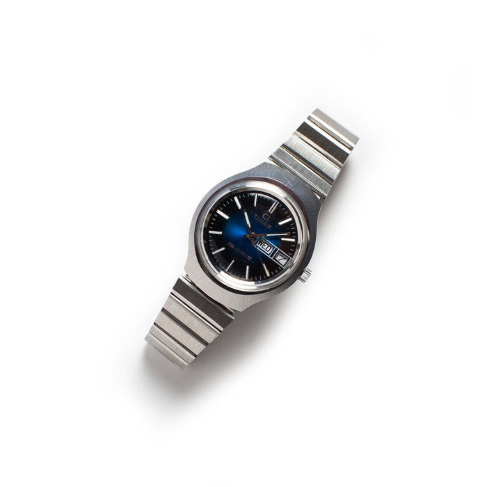 flatlay of the 1977 Timex Blue Dial Q Quartz