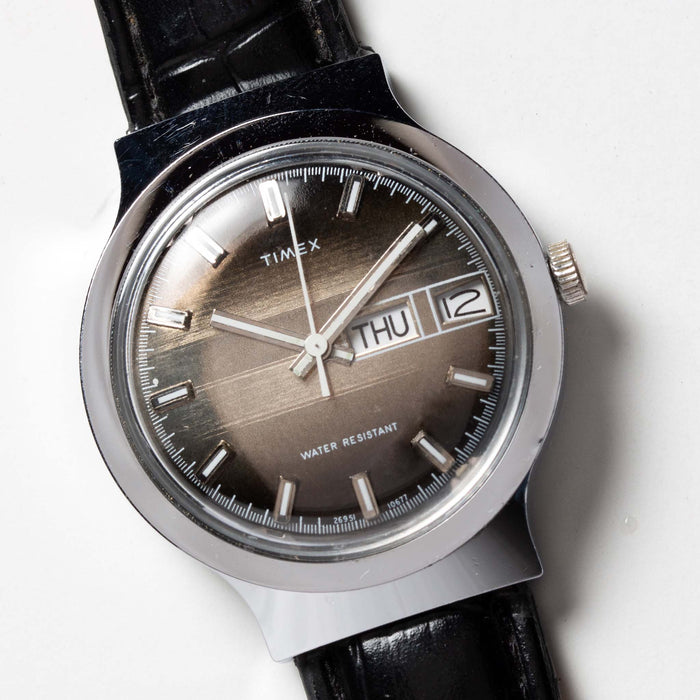 flatlay of the 1977 Timex Marlin M106, shown close up