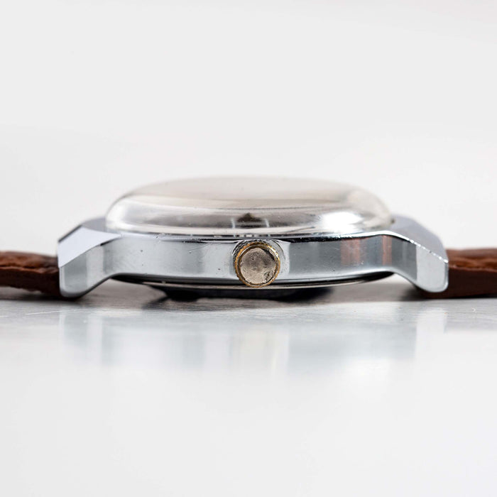 flatlay of the 1977 Timex Marlin, shown from the side