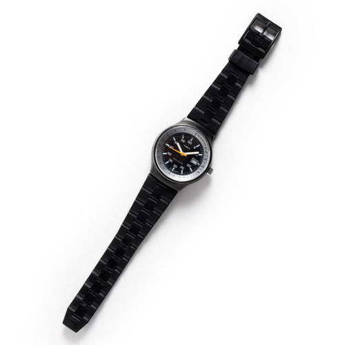 flatlay of the 1978 Timex Black Max