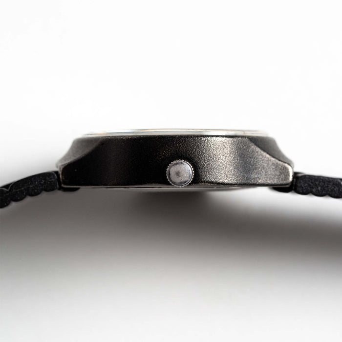 flatlay of the 1978 Timex Black Max, shown from the side