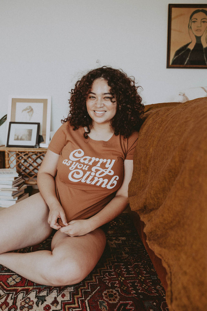 Woman sat on sofa wearing Brown Carry As You Climb Shirt for Women by The Bee and The Fox
