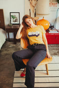 Woman wearing orange "Cat Lady" shirt
