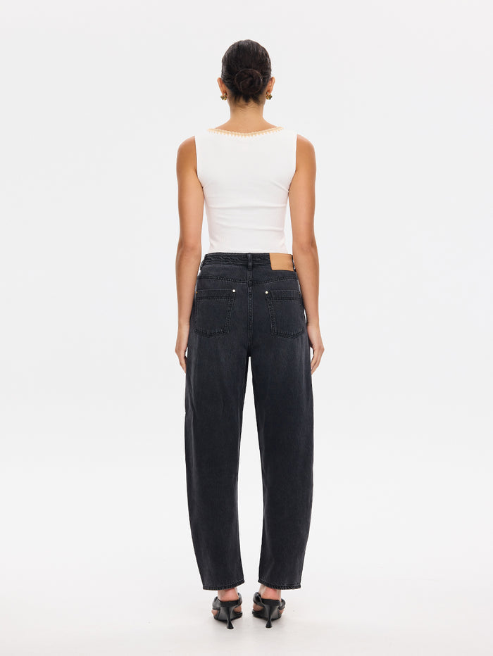 KIVARI Esme ivory tank top with wide-leg denim jeans and heels, back view