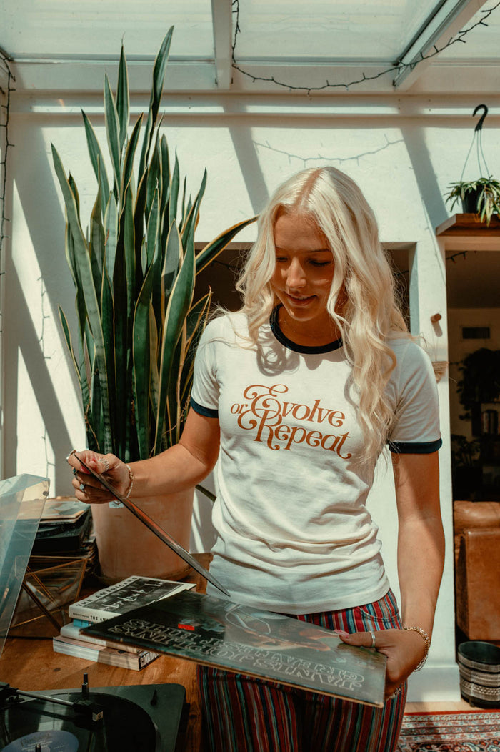Evolve or Repeat | Ringer Tee