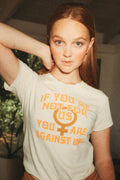 Woman wearing "If You're Not For Us, You're Against Us' shirt