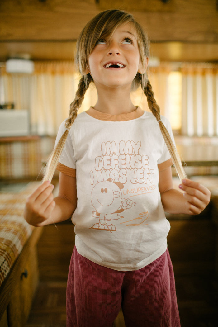 In My Defense I Was Left Unsupervised Kids Tee  by The Bee & The Fox