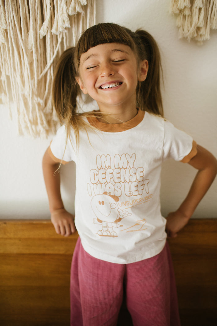 In My Defense I Was Left Unsupervised Kids Tee by The Bee & The Fox