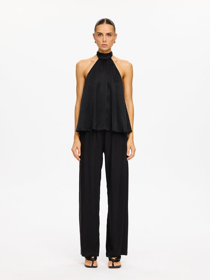 KIVARI Jaxon Halter Top in Black – full-length front view of model wearing women's black halter neck top with matching wide-leg pants