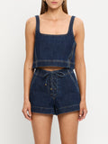 woman in two piece denim set
