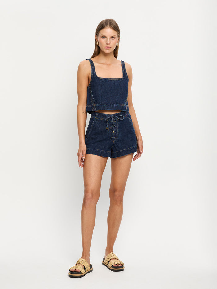woman in two piece denim set