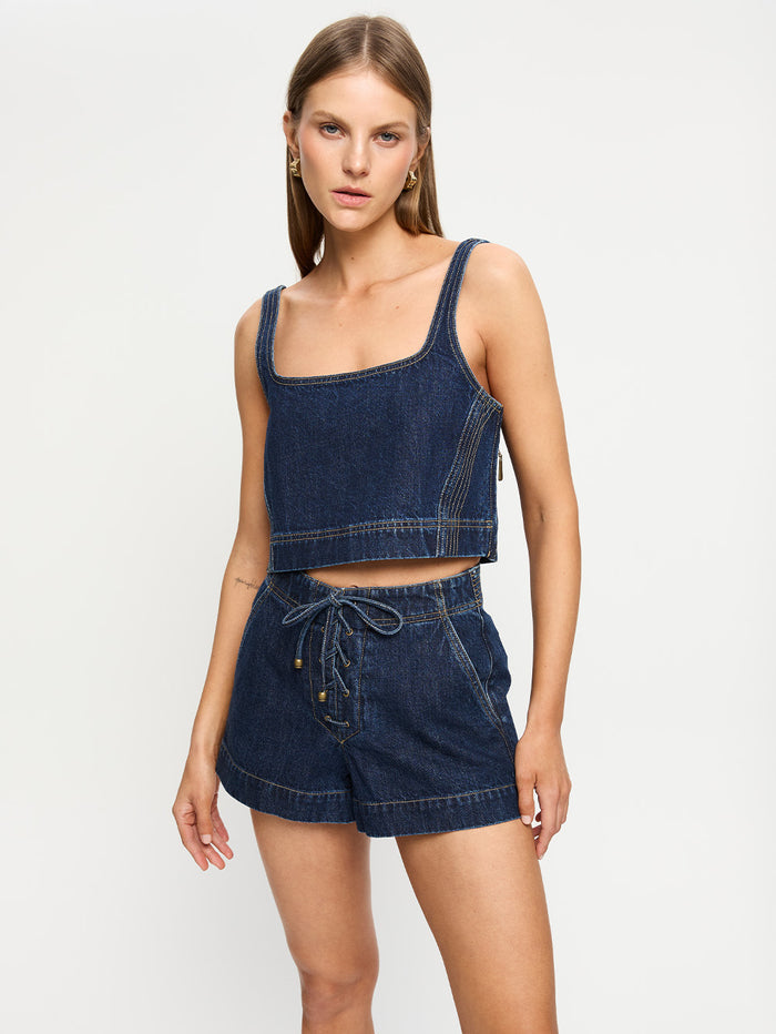 woman in two piece denim set