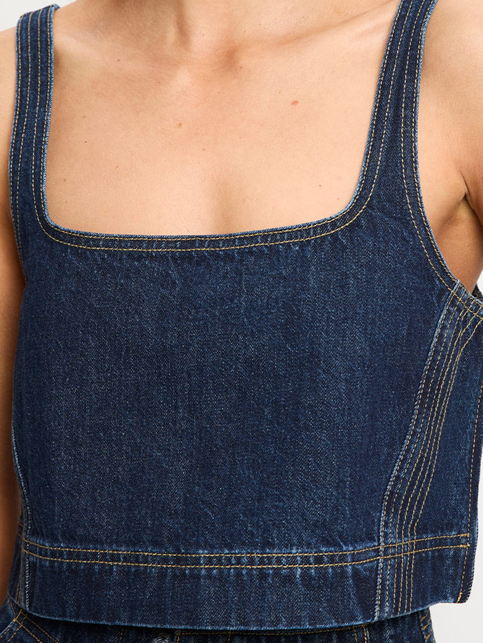 woman in two piece denim set