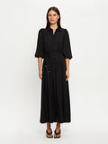 Woman wearing a black dress on a white background