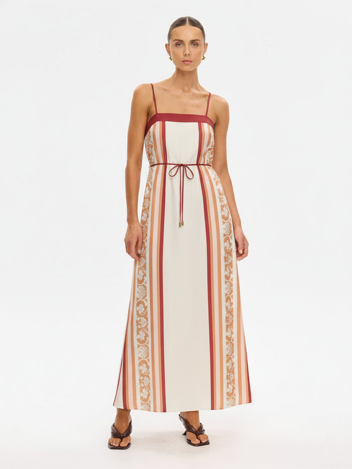 KIVARI Lilia Maxi Dress in cream stripe – full-length front view of women's linen maxi dress with floral lace side panel and tie waist