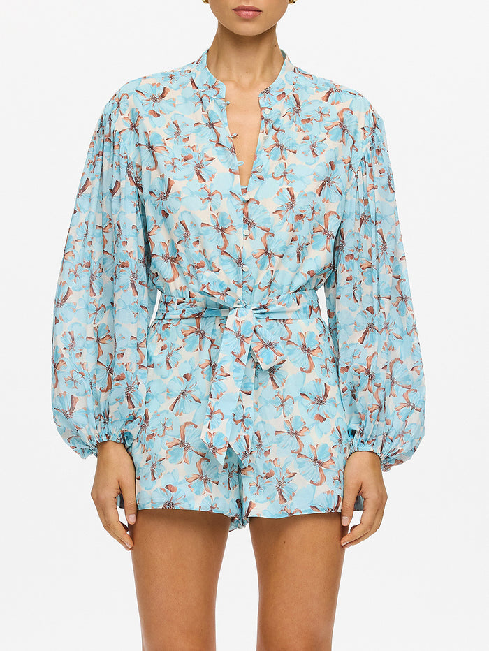 KIVARI Lydia Playsuit in Mint - close-up of tie waist and shorts detail on mint teal floral print playsuit