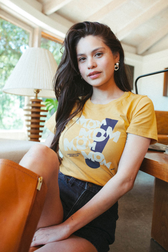 Woman wearing MOM! Overstimulated Moms Club shirt