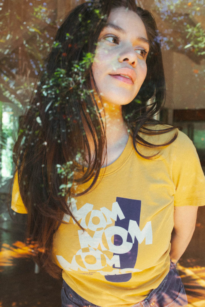 Woman wearing MOM! Overstimulated Moms Club shirt