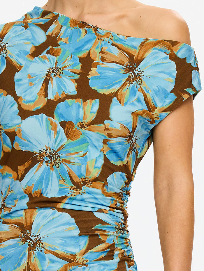 KIVARI Nieve Jersey Maxi Dress in Blue - close-up detail of blue and brown floral one-shoulder neckline and ruched bodice