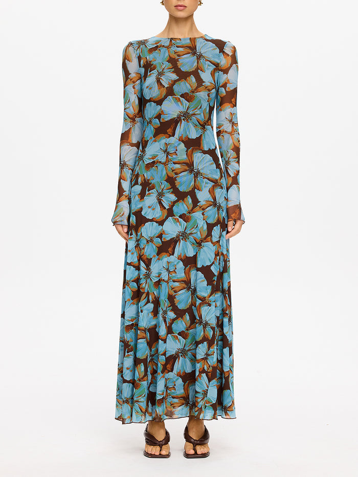 KIVARI Nieve Mesh Maxi Dress in Blue Floral Print – full-length front view of model wearing women's long-sleeve floral mesh maxi dress with flowy hem