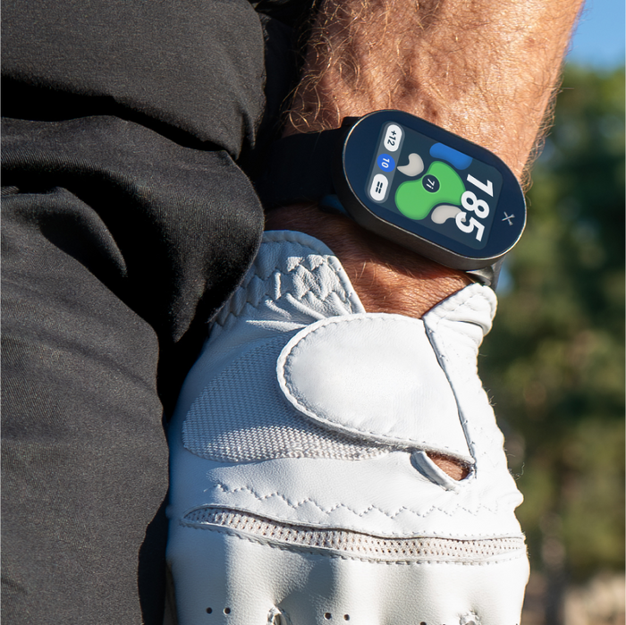 Man wearing PlayMaker+ GPS Golf Watch