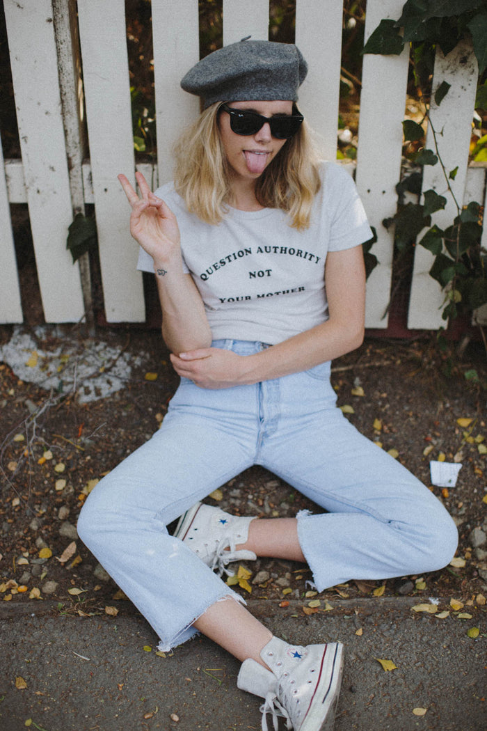 Woman sat on the ground outside wearing Question Authority Not Your Mother Shirt for Women by The Bee and The Fox