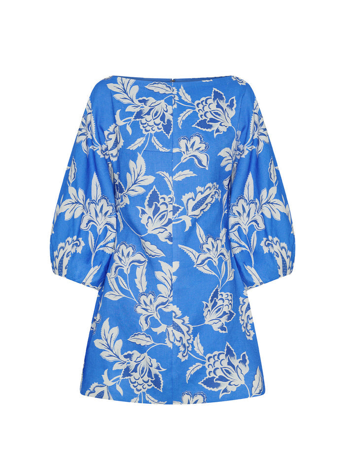 Blue dress with white floral pattern on a white background