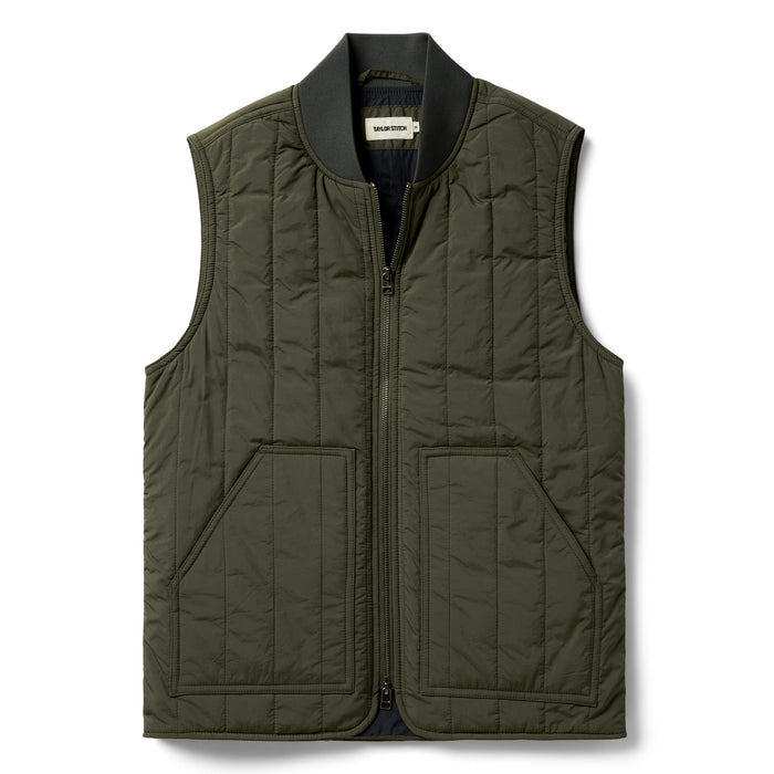 flatlay of The Able Vest in Quilted Army