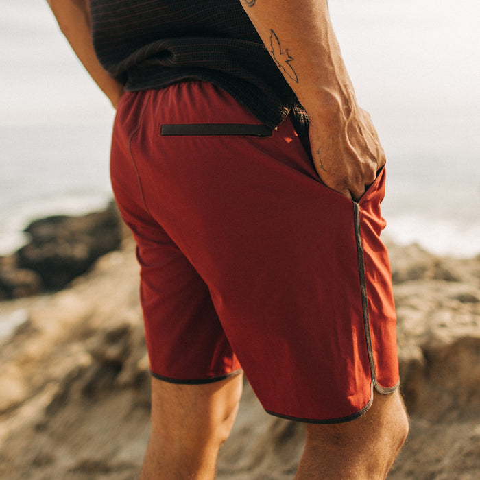 fit model showing the back of The Anchor Trunk in Red Clay