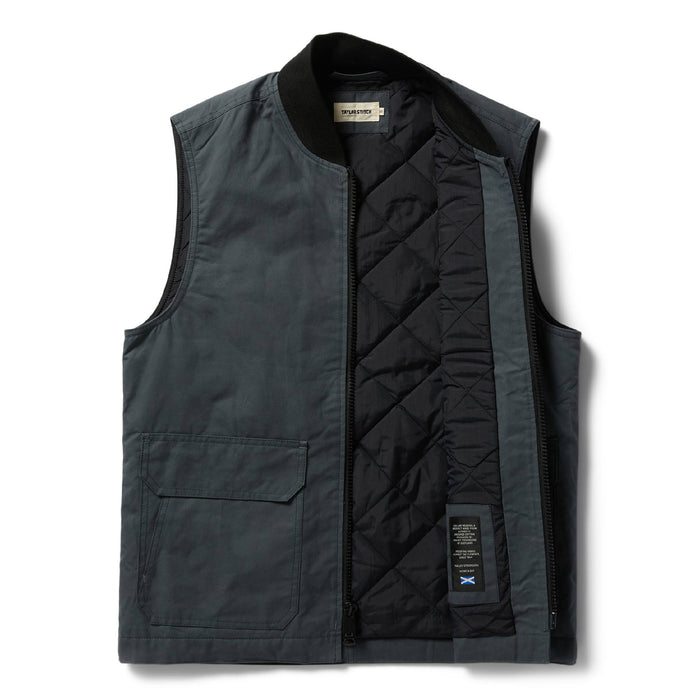 open flatlay of The Anchorage Vest in Charcoal Dry Wax