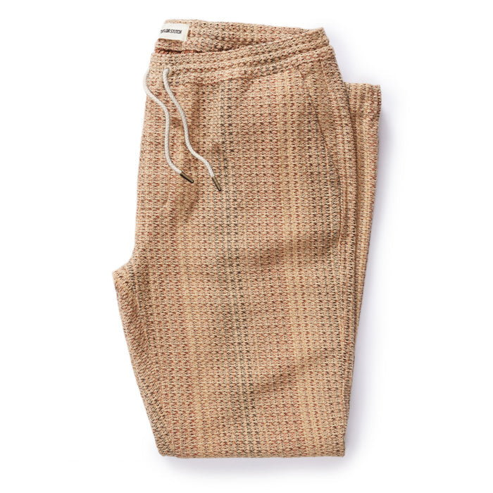 flatlay of The Apres Pant in Baja Stripe