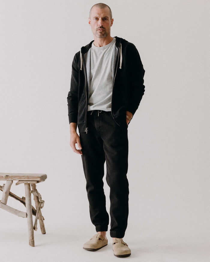 fit model posing in The Apres Pant in Black Indigo Sashiko