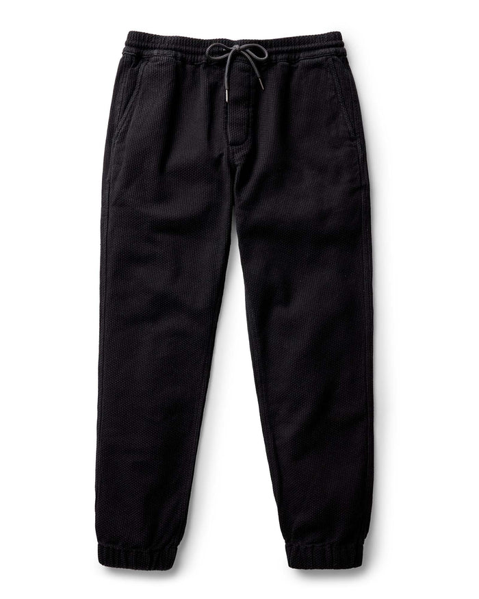 flatlay of The Apres Pant in Black Indigo Sashiko