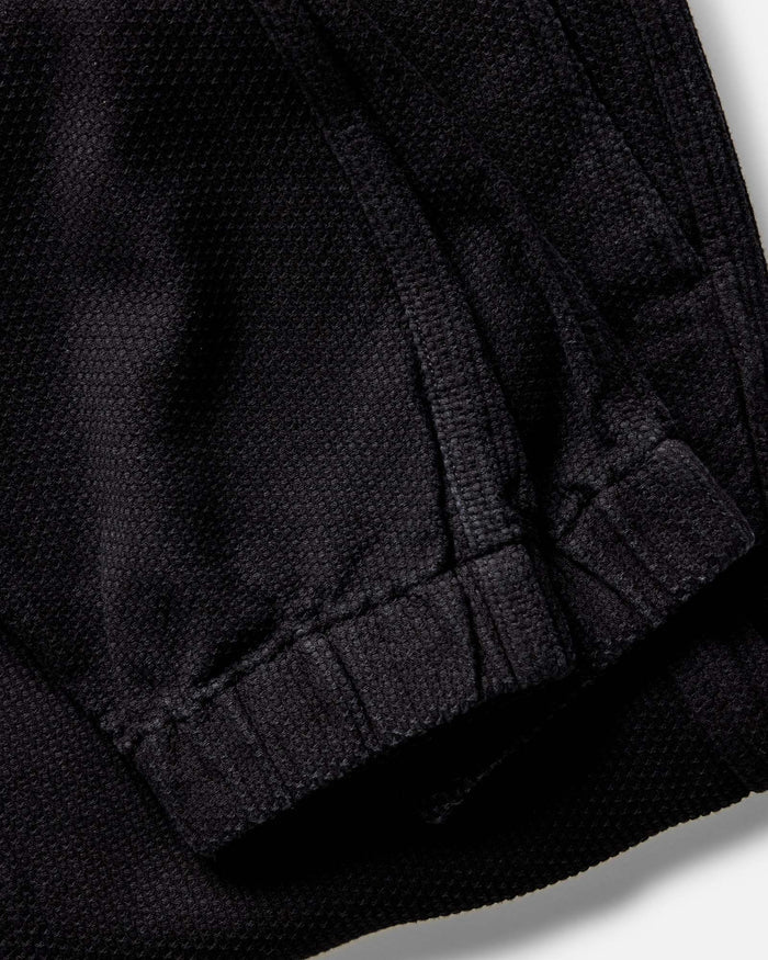 material shot of the cuff on The Apres Pant in Black Indigo Sashiko