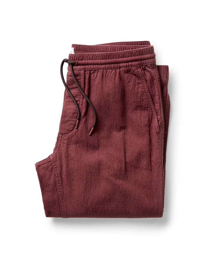 folded flatlay of The Apres Pant in Burgundy Double Cloth