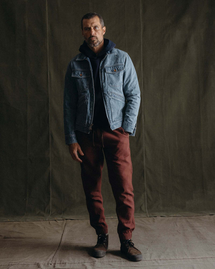 fit model showing off The Apres Pant in Burgundy Double Cloth
