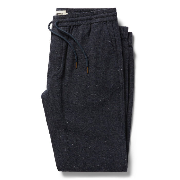 flatlay of The Apres Pant in Charcoal Donegal