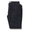 flatlay of The Apres Pant in Charcoal Donegal