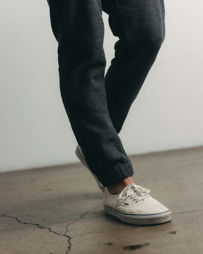 fit model wearing The Apres Pant in Charcoal Sashiko, up close shot