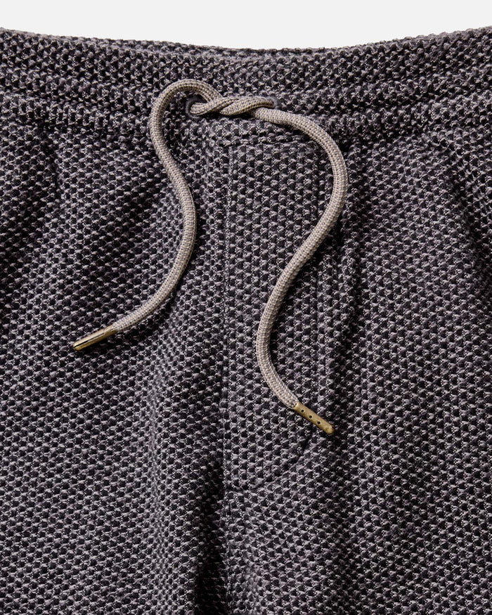 fit model wearing The Apres Pant in Charcoal Sashiko, cuff detail